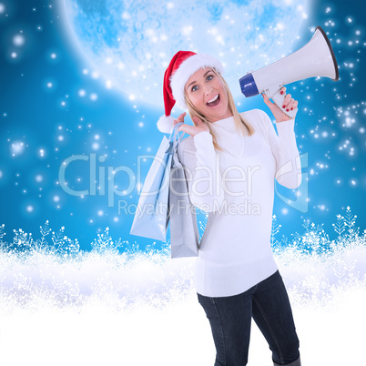 Composite image of festive blonde holding gift bags and megaphon