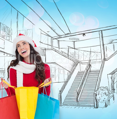 Composite image of festive brunette opening shopping bag