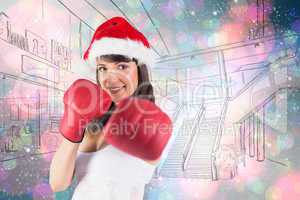 Composite image of festive brunette punching with boxing gloves