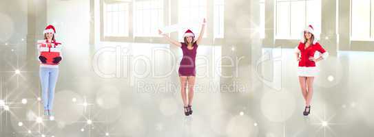 Composite image of santa girl standing with hands on hips