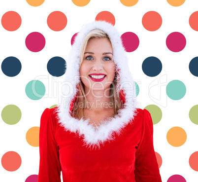 Composite image of festive blonde smiling at camera