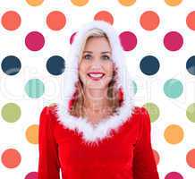 Composite image of festive blonde smiling at camera