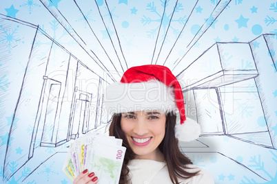 Composite image of happy brunette holding her cash