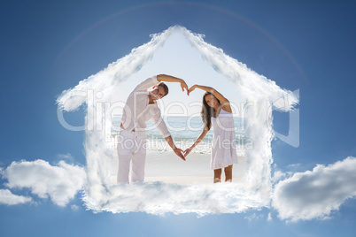 Composite image of romantic couple forming heart shape with arms