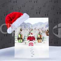 Composite image of santa delivery presents to village