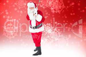 Composite image of cheerful santa claus playing golf