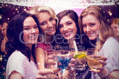 Composite image of friends with drinks