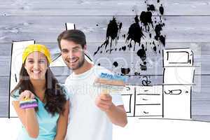 Composite image of happy young couple painting together