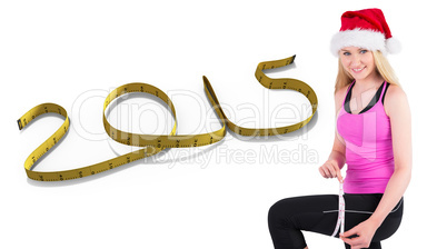 Composite image of fit festive young blonde measuring her thigh