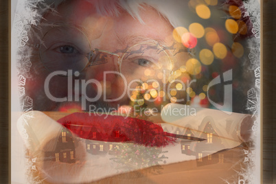 Composite image of santa claus is watching happy