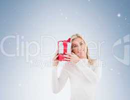 Blonde holding a christmas gift