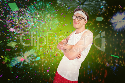 Composite image of geeky hipster posing in sportswear