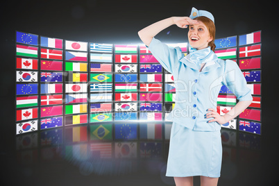 Composite image of pretty air hostess looking up