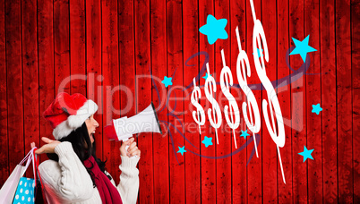 Composite image of woman holding some shopping bags