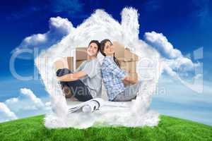 Composite image of beautiful couple sitting back-to-back