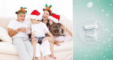 Composite image of family on christmas day looking at their pres