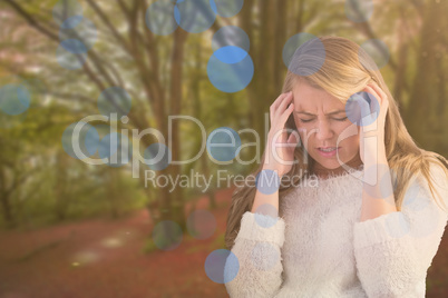 Composite image of pretty blonde getting a headache on the couch