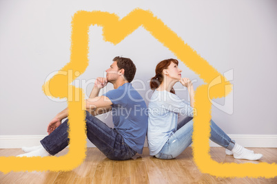 Composite image of couple sitting on floor together