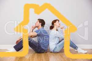 Composite image of couple sitting on floor together