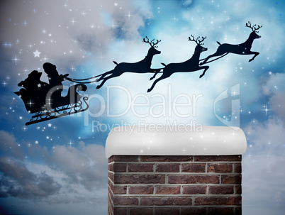 Composite image of santa flying his sleigh