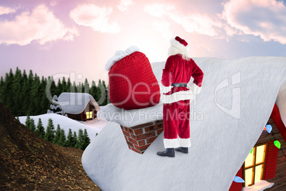 Composite image of santa on cottage roof