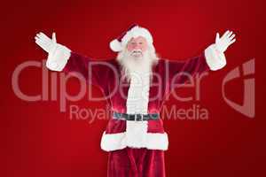 Composite image of jolly santa opens his arms to camera