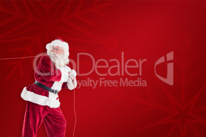 Composite image of santa pulls something with a rope