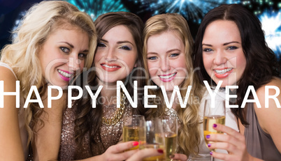 Composite image of friends drinking champagne