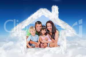 Composite image of portrait of a family at the beach