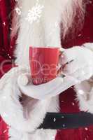 Composite image of santa holds a red cup