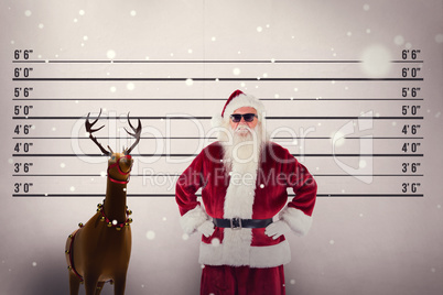 Composite image of santa claus wears black sunglasses