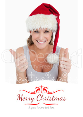 Composite image of portrait of a woman with the thumbs up and a