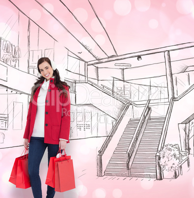 Composite image of happy brunette in winter clothes holding shop