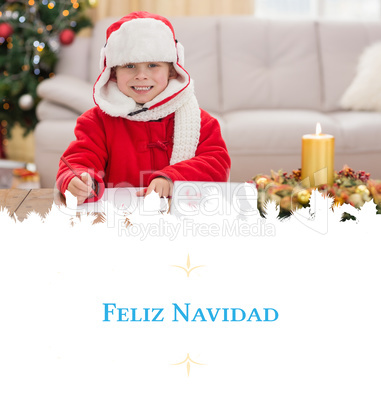 Composite image of festive little boy smiling at camera