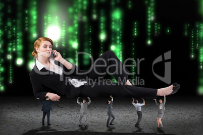 Composite image of business people supporting boss