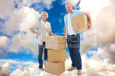 Composite image of older couple smiling at camera with moving bo