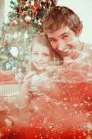 Composite image of father and little girl playing with christmas
