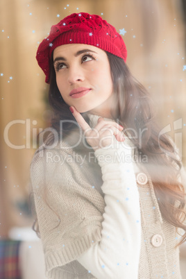 Composite image of portrait of a brunette in day dreaming