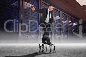 Composite image of business people supporting boss