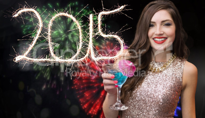 Composite image of brunette with cocktail