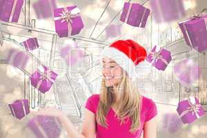 Composite image of festive blonde presenting with hand