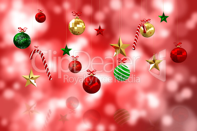 Composite image of digitally generated hanging christmas decorat