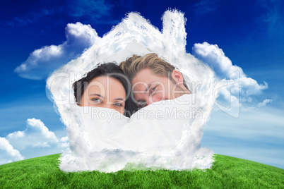 Composite image of couple hiding under the duvet