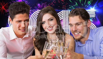 Composite image of friends toasting with champagne