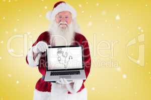 Santa claus presents a laptop