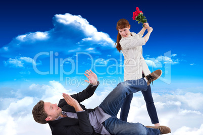 Composite image of woman throwing roses at man