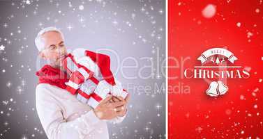 Composite image of happy festive man with gifts