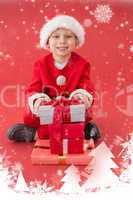 Composite image of cute little boy in santa costume with gifts