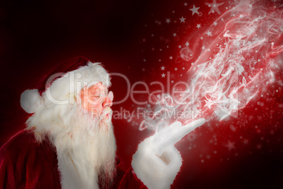 Composite image of santa claus blowing