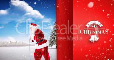 Composite image of santa claus pulling a rope